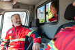© zinkevych - Team of paramedics talking in the ambulance car