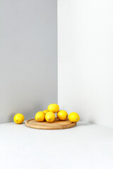 Poster - Fresh yellow lemon fruits and gray wall background. 