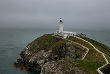 Aerial View Of South Stack Lighthouse On The Cliff Holy Island, Anglesey, Wales Overlooking The Sea