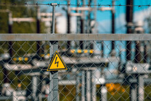 Electrical Hazard Sign  On A Fence Of An High-voltage Substation
