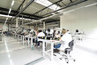 © industrieblick - workers in a factory for the production of electronics - modern industrial enterprise