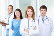 © BillionPhotos.com - Medical team of doctors on hospital background