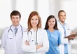 © BillionPhotos.com - Medical team of doctors on hospital background