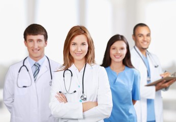 Wall Mural - Medical team of doctors on hospital background