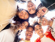 © gonzagon - Best friends having fun concept multiethnic teen friends group looking down