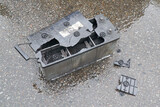 Fototapeta Zwierzęta -   The destroyed battery. The concept of untimely battery maintenance, leading to dangerous consequences.