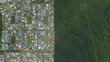 Forest and city border, forest and city separated by straight line, looking down aerial view from above – Bird’s eye view forest and city border Jardim acapulco, Guaruja - Sao Paulo, Brazil