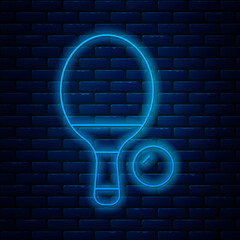 Poster - Glowing neon line Racket for playing table tennis icon isolated on brick wall background. Vector