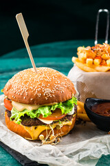 Poster - Big yummy burger with cheese, fries. Fast food set.