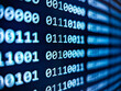 © deberarr - Closeup view of binary computer code with 1s and 0s displayed on a blue screen with focus blur effect