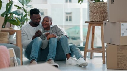 Canvas Print - Couple, home and floor with coffee after moving to new building, flat or apartment. Happy, black man and girl in home, living room or house after move with furniture, boxes and plants in Atlanta