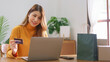 © Pichsakul - Business at home concept, Businesswoman is typing credit card data on laptop to shopping online