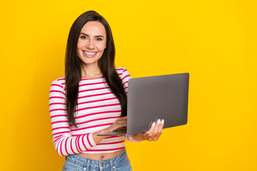 Poster - Photo of young attractive smiling professional programmer coder new software isolated on yellow color background