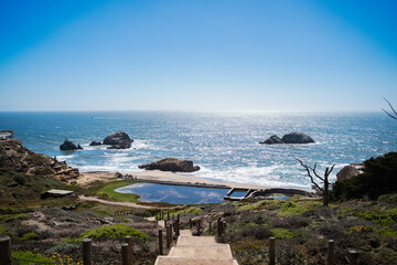 View of Sutro Baths at Lands end lookout on bright sunny day with ocean and rocks. Travelling in the usa NoCal California Nature travel landscape background