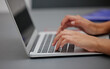 © Siphosethu F/peopleimages.com - Laptop, computer or hand working, typing on keyboard for planning, schedule and meeting review in office desk. Zoom, hands and strategy analytics for marketing agency, research or SEO KPI data growth