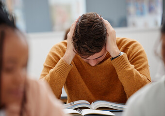 Poster - University, study and tired student reading book in class while studying for test or exam. Education, stress and burnout man with headache, knowledge and scholarship learning college work in library.