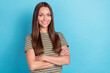 © deagreez - Portrait photo of young adorable gorgeous nice woman wear khaki striped t-shirt folded arms toothy smile asisstant isolated on bright blue color background