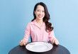 © Timeimage - Young Asian woman eating, eat concept