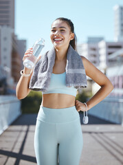 Fitness, tired and water bottle of woman in urban city portrait happy with workout results or exercise in summer. Wellness young sports, athlete girl drink water after healthy outdoor cardio training