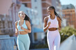 © Siphosethu F/peopleimages.com - Fitness, women and city friends running in street on summer morning in Brazil. Health, urban exercise and girl time to workout and laugh, black woman and best friend or personal trainer run together.
