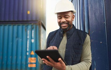 Canvas Print - African american shipyard worker, shipping logistics and transportation of international commercial goods. Tablet for inventory management, import and export of cargo in the distribution supply chain