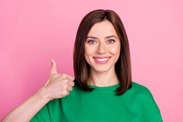 Sticker - Closeup photo of young smiling attractive girl thumb up recommend new shopping ad buy online isolated on pink color background