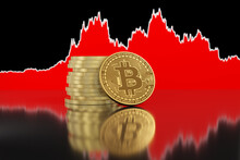 Stack Of Golden Bitcoins On Red Area Graph Of Its Price. Illustration Of Cryptocurrency Investment And Price Fluctuation