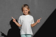 © Ruslan Ivantsov - little girl in white t-shirt. space for your logo or design.