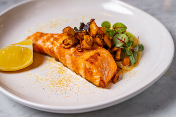 Wall Mural - grilled salmon with mushrooms on a plate