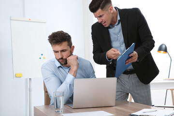 Wall Mural - Boss screaming at employee in office. Toxic work environment