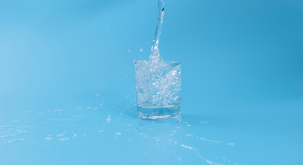 pouring water into the glass