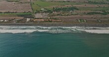 Palo Grande Panama Aerial V8 Cinematic Birds Eye View Overlooking At Pacific Ocean Tilt Up Reveals Coastal Beach And Rural Farmland With Stormy Clouds In The Sky - Shot With Mavic 3 Cine - April 2022