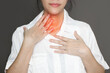 Woman is touch chest and neck with thirsty, flu, cold. Health care concept.