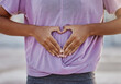 Hands, heart and stomach with a healthy woman hand icon of health, wellness and diet for body care. Care, abdomen and symbol with a female touching her tummy and making a gesture of love or affection