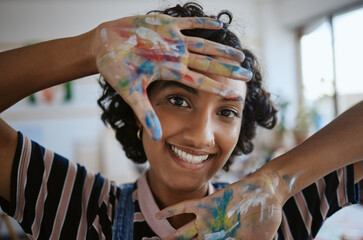 Creative portrait, woman hands with paint on happy art school student and oil painting inspiration for Indian girl. Fun learning color theory and young artist creativity in university workshop studio
