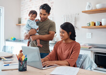 Internet, Family And Parents Doing Research On Down Syndrome With Baby On A Laptop In Their House. Mother And Father With Smile For Child And Working On Taxes Or Finance Budget On The Computer