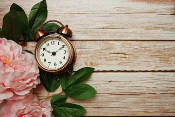 Sticker - Alarm clock with pink peony flowers border frame on wooden background