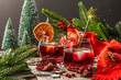 © FuzullHanum - Low alcoholic cocktail with fruits syrup and ice. Sparklers, Christmas traditional decor, New Year