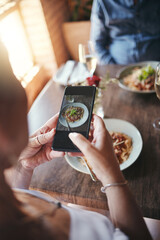 Poster - Phone, food and social media with the hands of a woman taking a photograph while eating in a restaurant during a date. Mobile, internet and romance with a female snapping a picture while dating