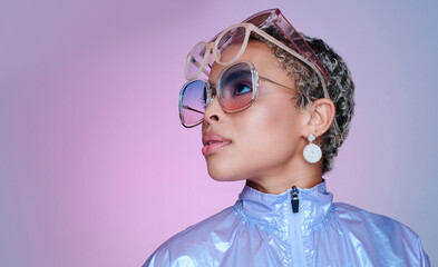 Wall Mural - Sunglasses, fashion and black woman in neon clothes in color studio mock up space for advertising and marketing. Gen z girl or african model with futuristic vaporwave style on purple pink background