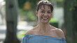 © Marco - Happy older woman walking in street smiling at camera. One middle aged 50s female person walks outdoors portrait