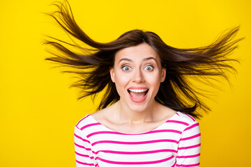 Wall Mural - Photo of astonished satisfied cool joyful lady girl rejoice has fun chill relax holiday weekend party isolated on yellow color background