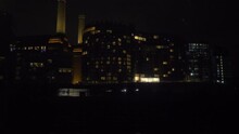 London Train Overground Night Time Passing Flats Battersea Power Station