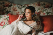 © ADDICTIVE STOCK - Bride talking on phone