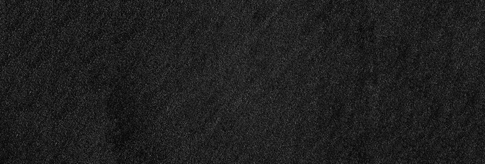 Wall Mural - dark stone wall surface wide background. empty black stone texture.