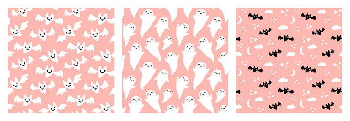 Cute black and white bats and ghosts Halloween seamless pattern set on pastel pink background.
