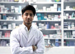 asian pharmacist at drug store