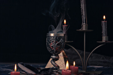 Canvas Print - Witchcraft composition with burning candles, jewelry and pentagram symbol. Halloween and occult concept, black magic ritual.