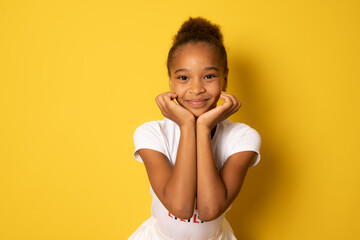 Wall Mural - Close-up portrait of her she nice-looking attractive lovely healthy glad cheerful african american girl enjoying good mood idea solution isolated on yellow background