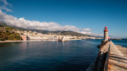 Wall Mural - Entrance to the old port and the city of Bastia on the east coast of Corsica